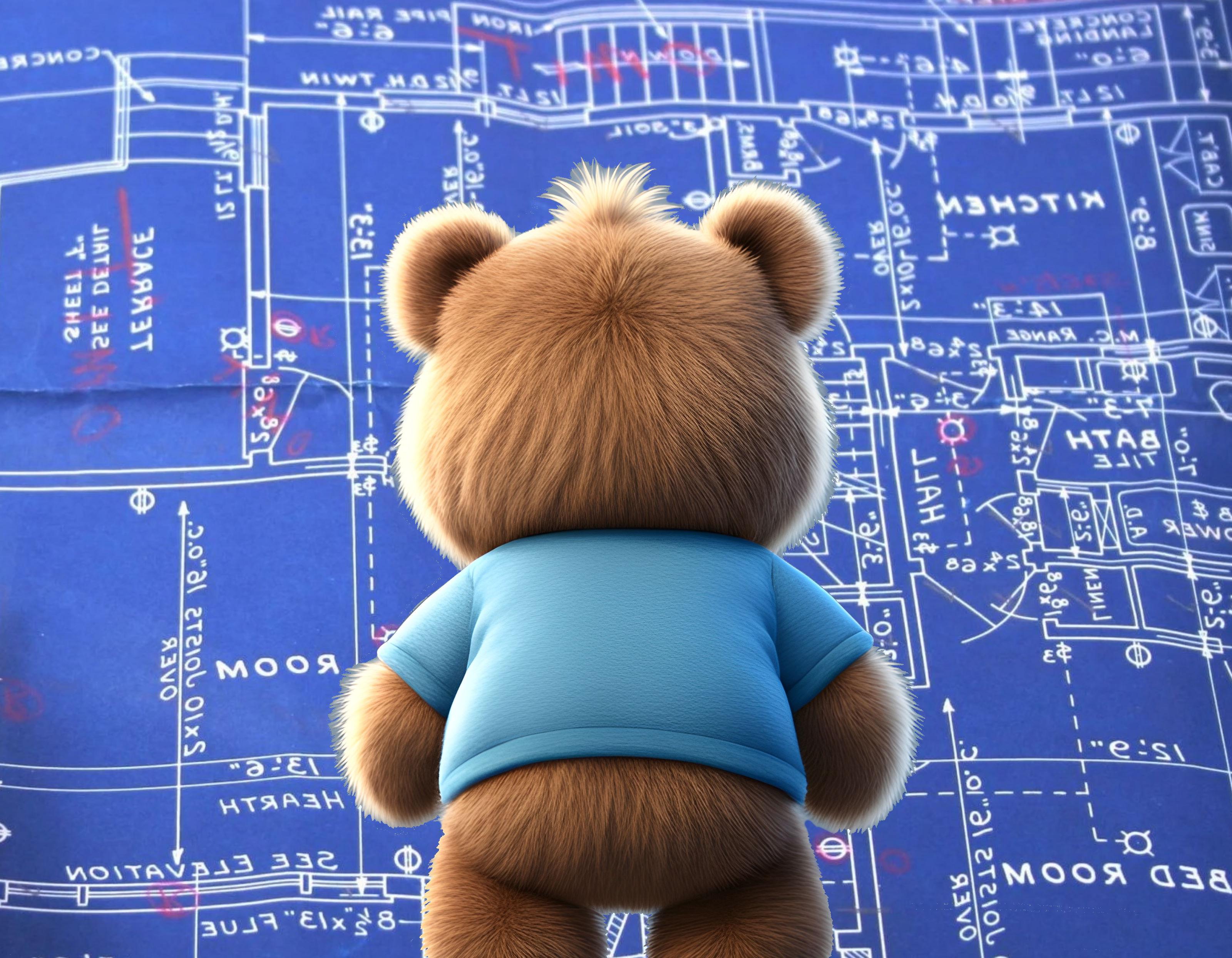 Bear in front of blue prints